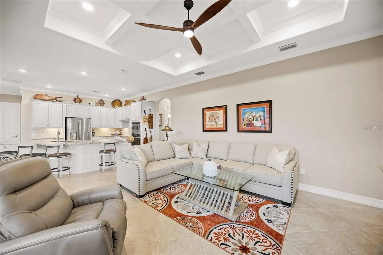 The family room and kitchen blend for effortless entertaining.