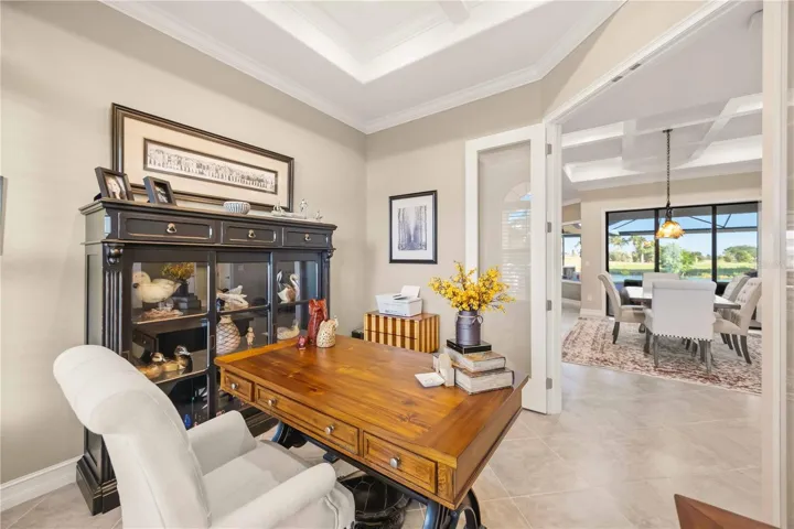 The office - stunning french doors, grid ceiling, amazing creativity in this home and well constructed.