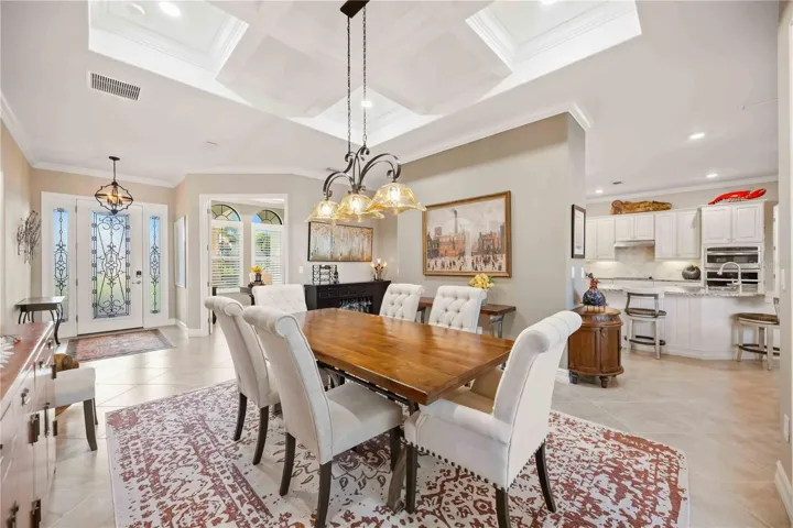 The dining room is the focal point as you enter the home.  the owners took the original dining room and made it an office.  The living room became the dining room and they removed the wall to open the home.  Simply stunning.