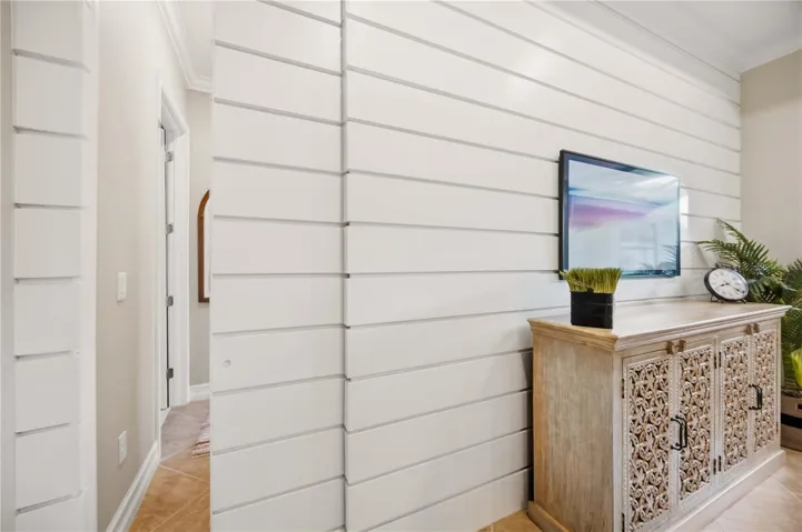 Shiplap wall with hidden shiplap pocket door.  Meticulous craftmanship!