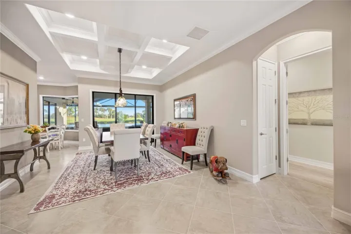 The primary bedroom entry is off the dining room.  The owners added a closet and reconfigured the entry to the room for additional privacy