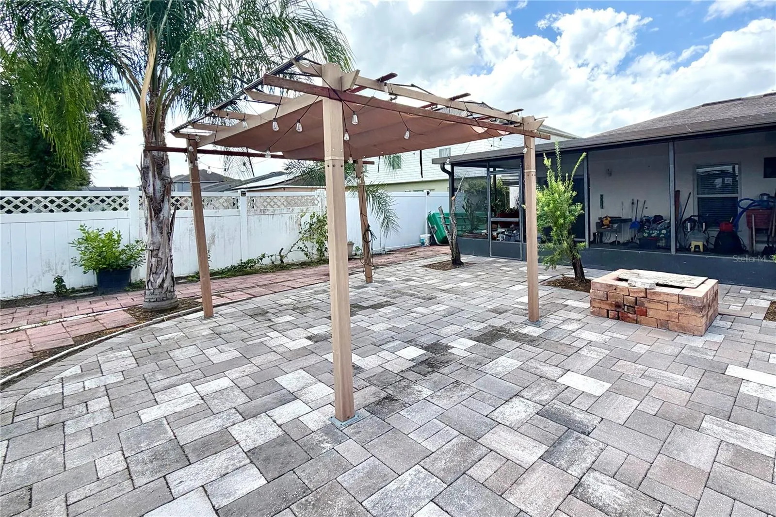 Firepit and gazebo just off the screened porch