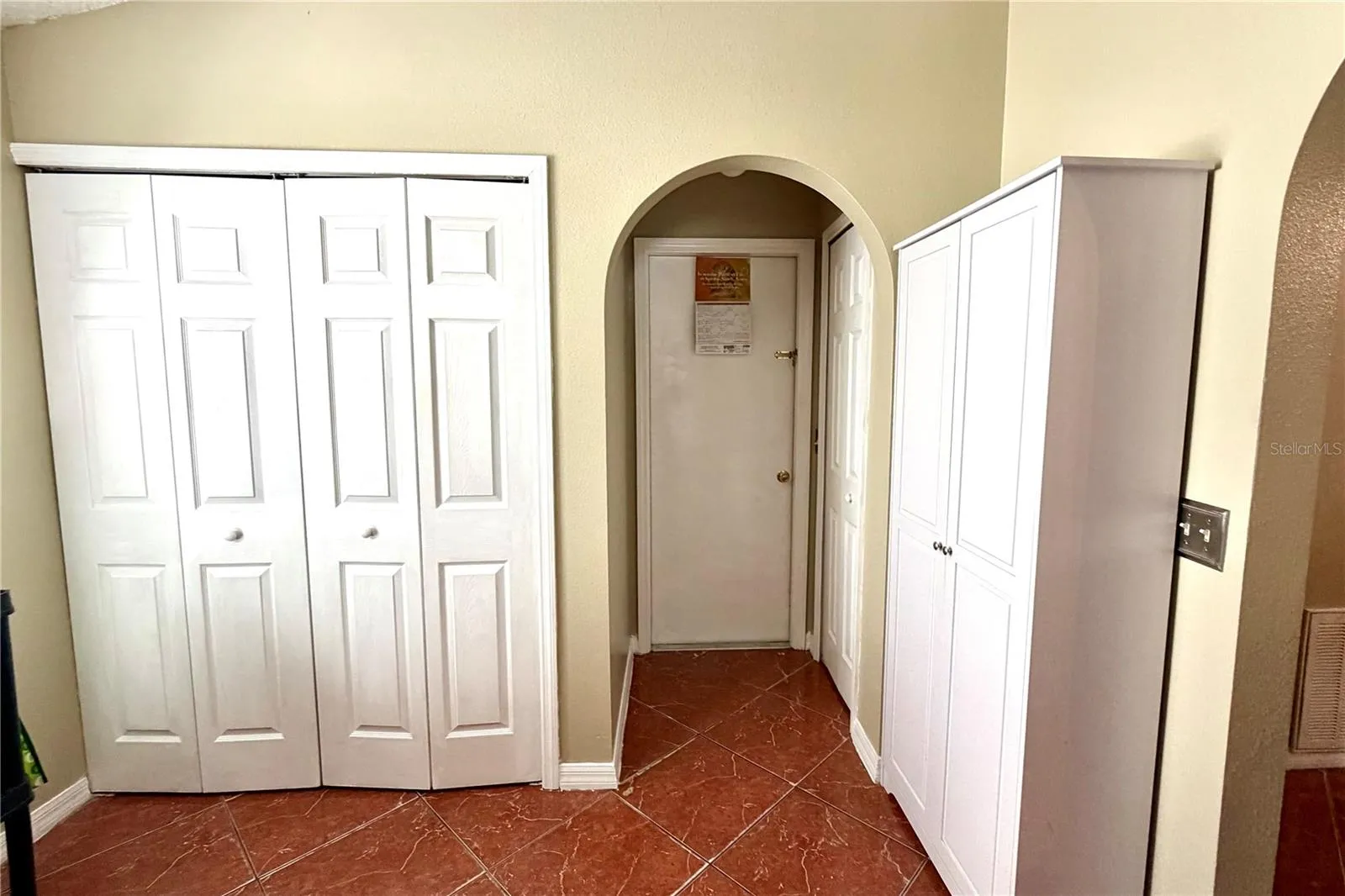 in-kitchen laundry closet and extra pantry space