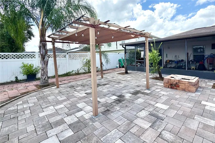 Firepit and gazebo just off the screened porch