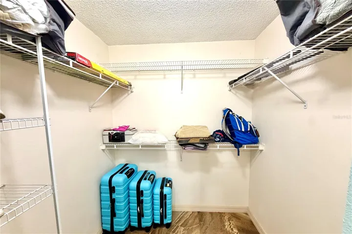 Walk-in closet in primary room