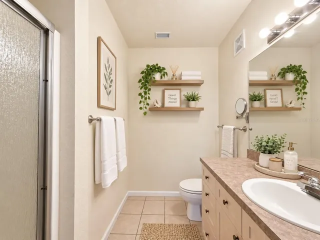 Primary Bathroom - walk-in shower with built in bench