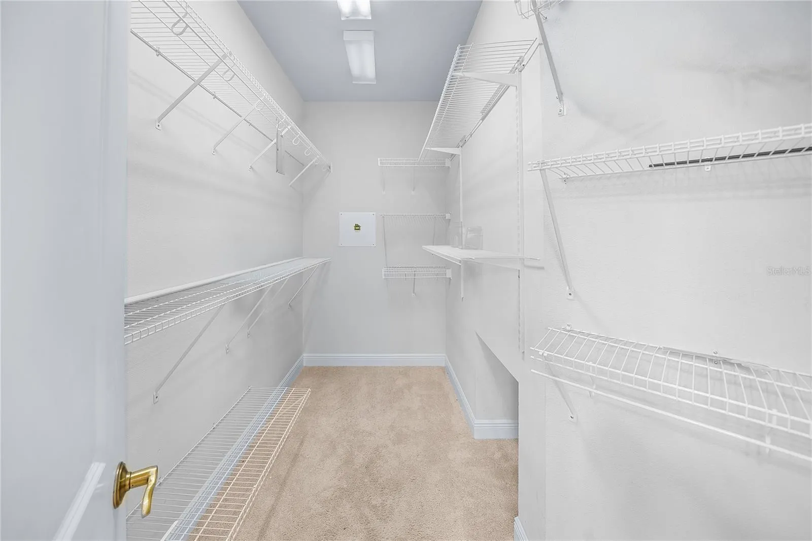 WALK-IN CLOSET OF THE MASTER BEDROOM