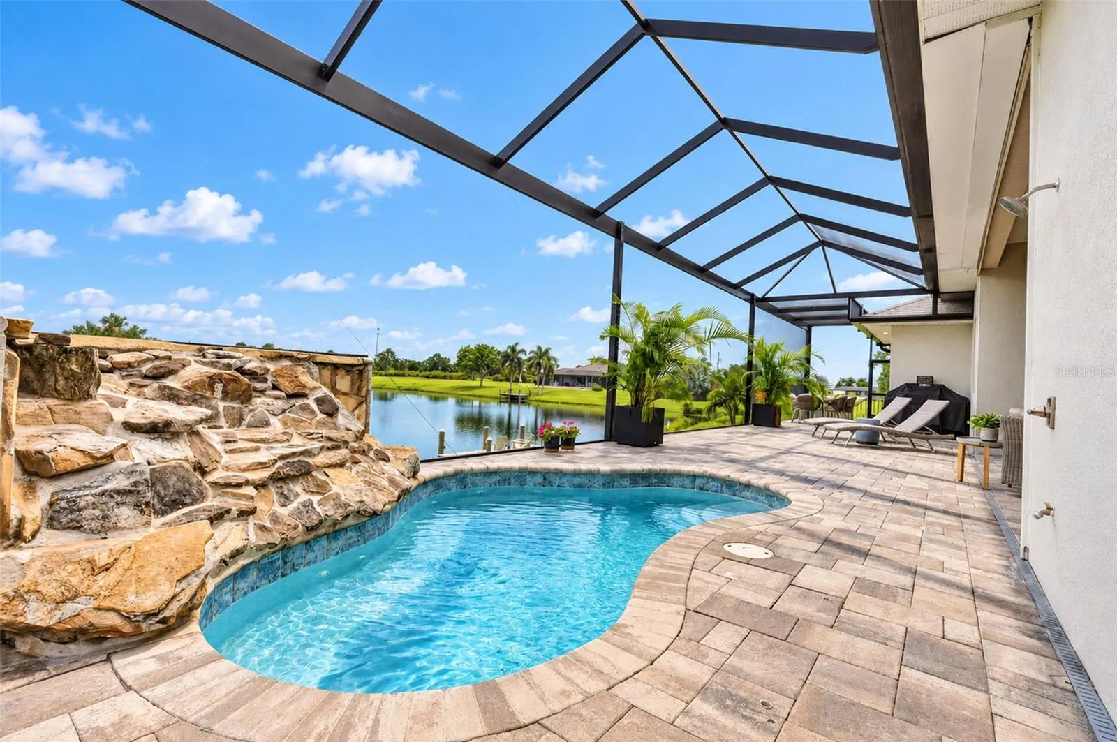Heated pool with waterfall