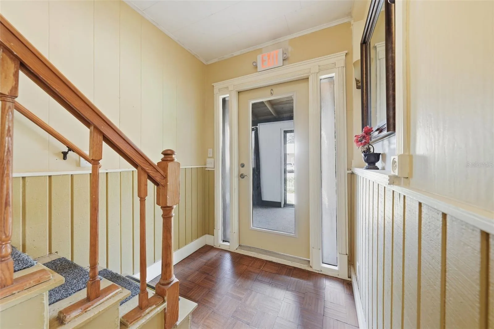 Foyer-stairs to bedrooms 2 and 3
