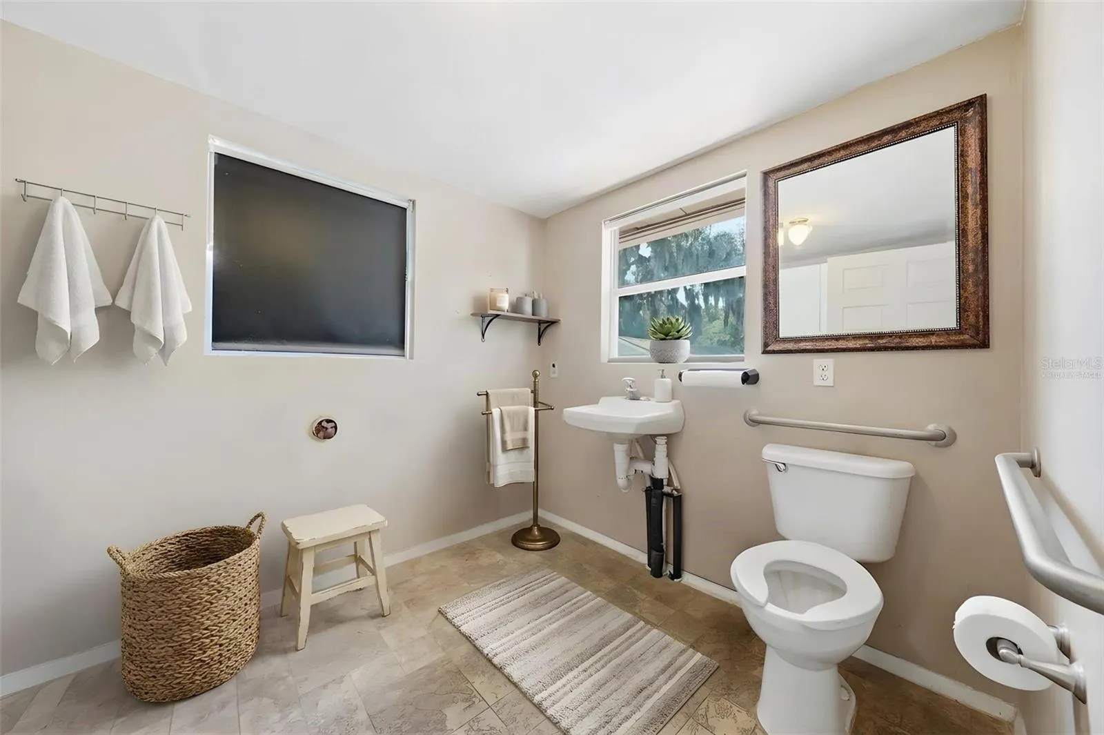 Virtually staged Handicap accessible half bath