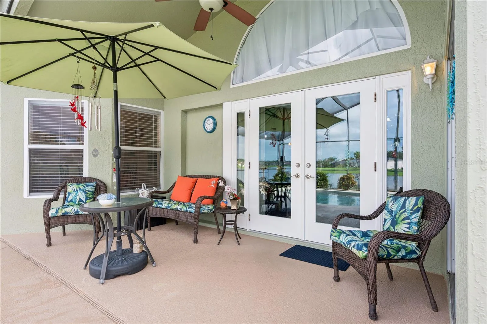 New french doors lead to outdoor paradise