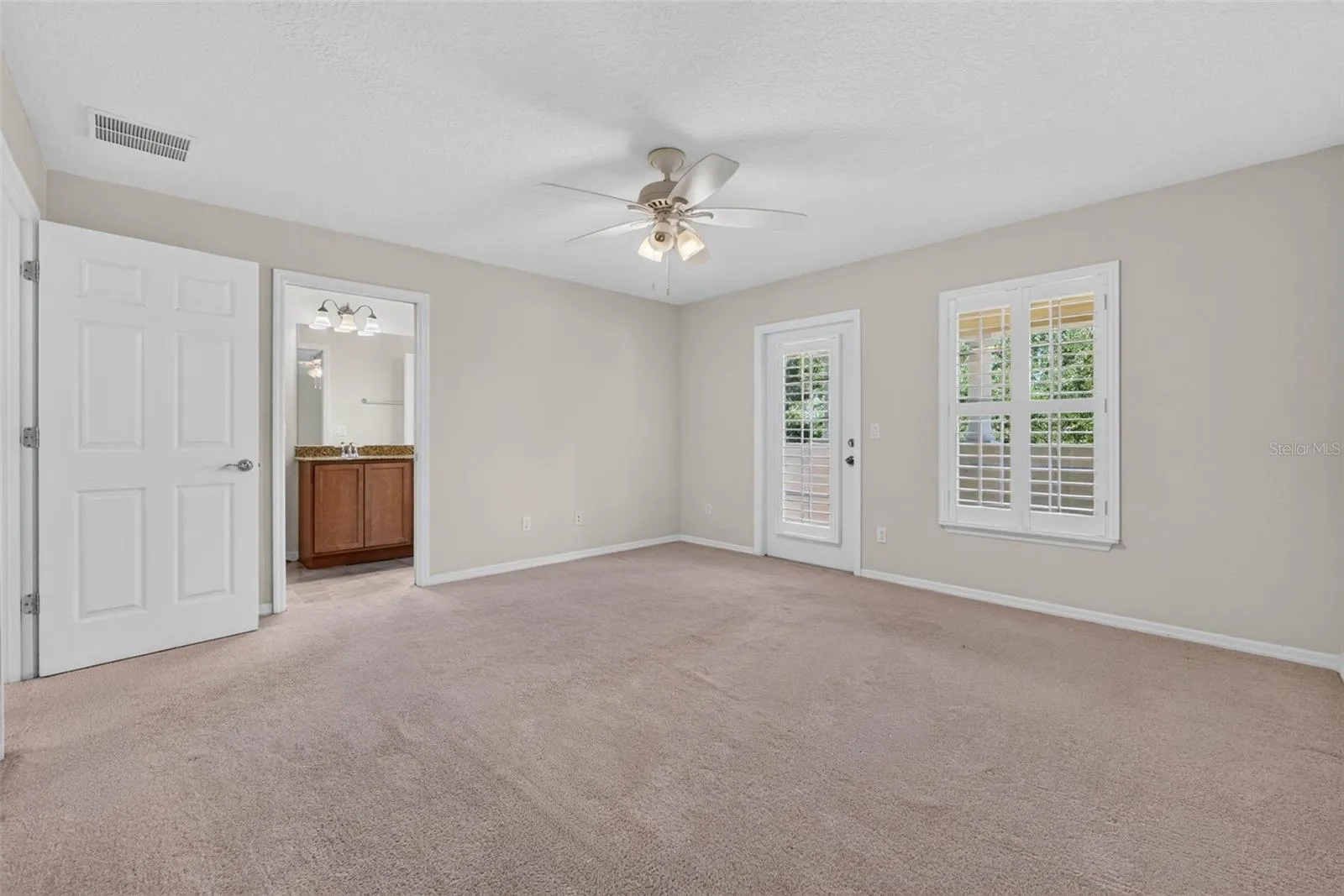 Upstairs en-suite with private balcony, water view