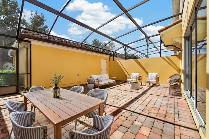 Screened-in courtyard *staged