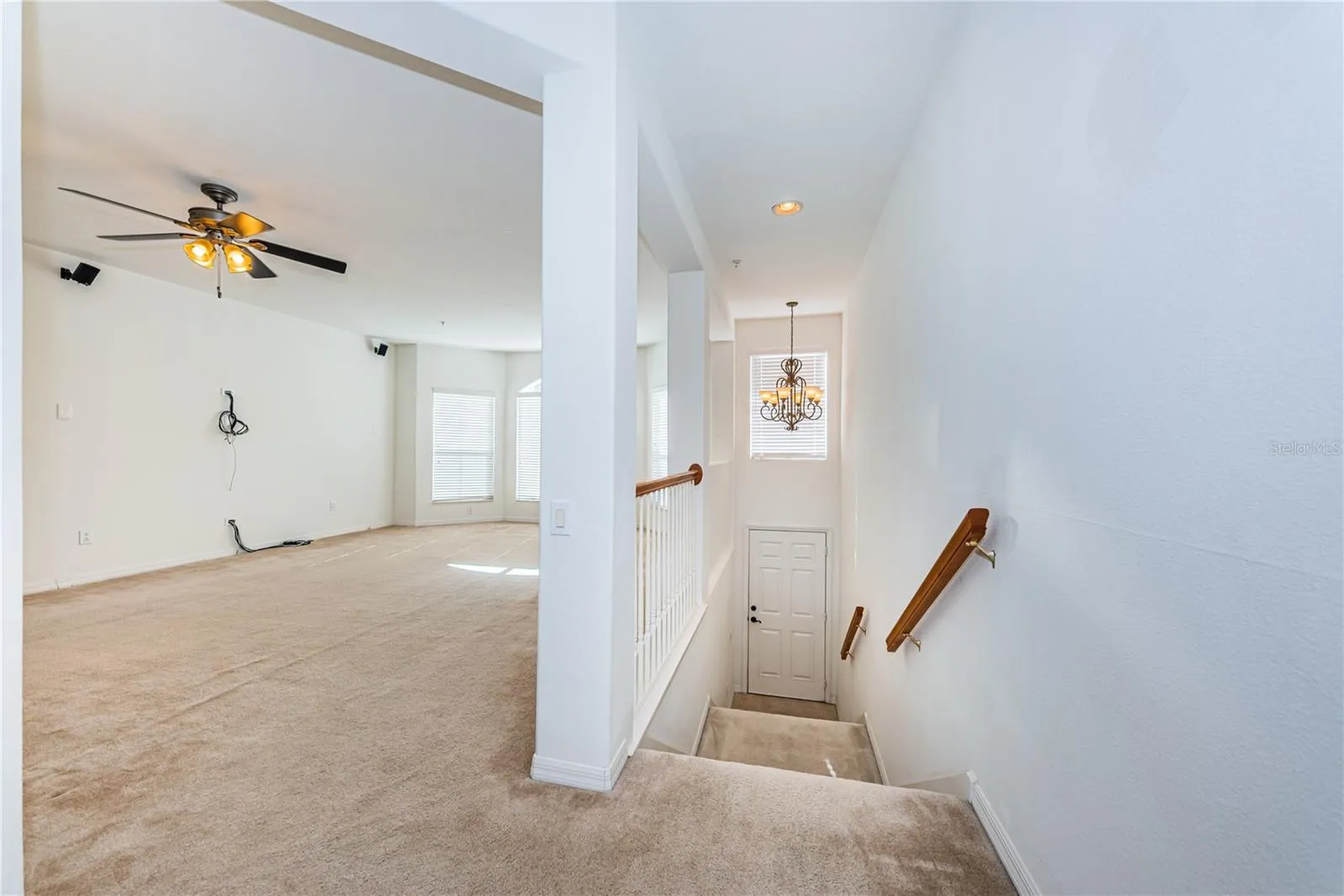 Foyer and stairs up to living room