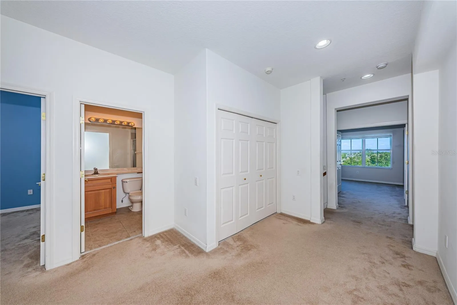 Bedroom level loft with laundry behind center doors