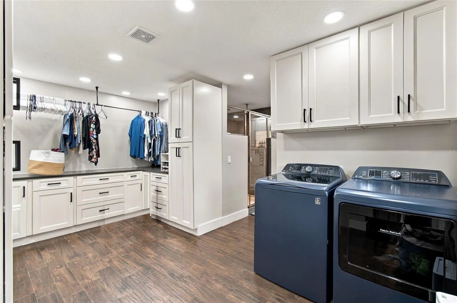 Walk-in Closet + Laundry - AI enhanced