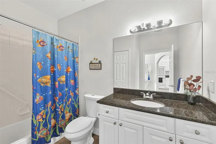 Full bathroom off the hallway granite countertops