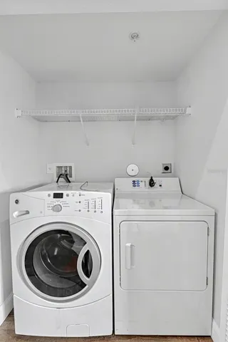 Closet laundry in main hallway