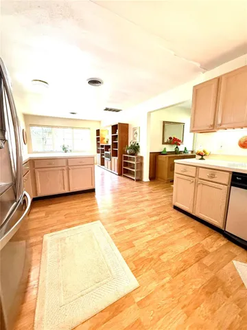 Kitchen has Light Brich Cabinetry