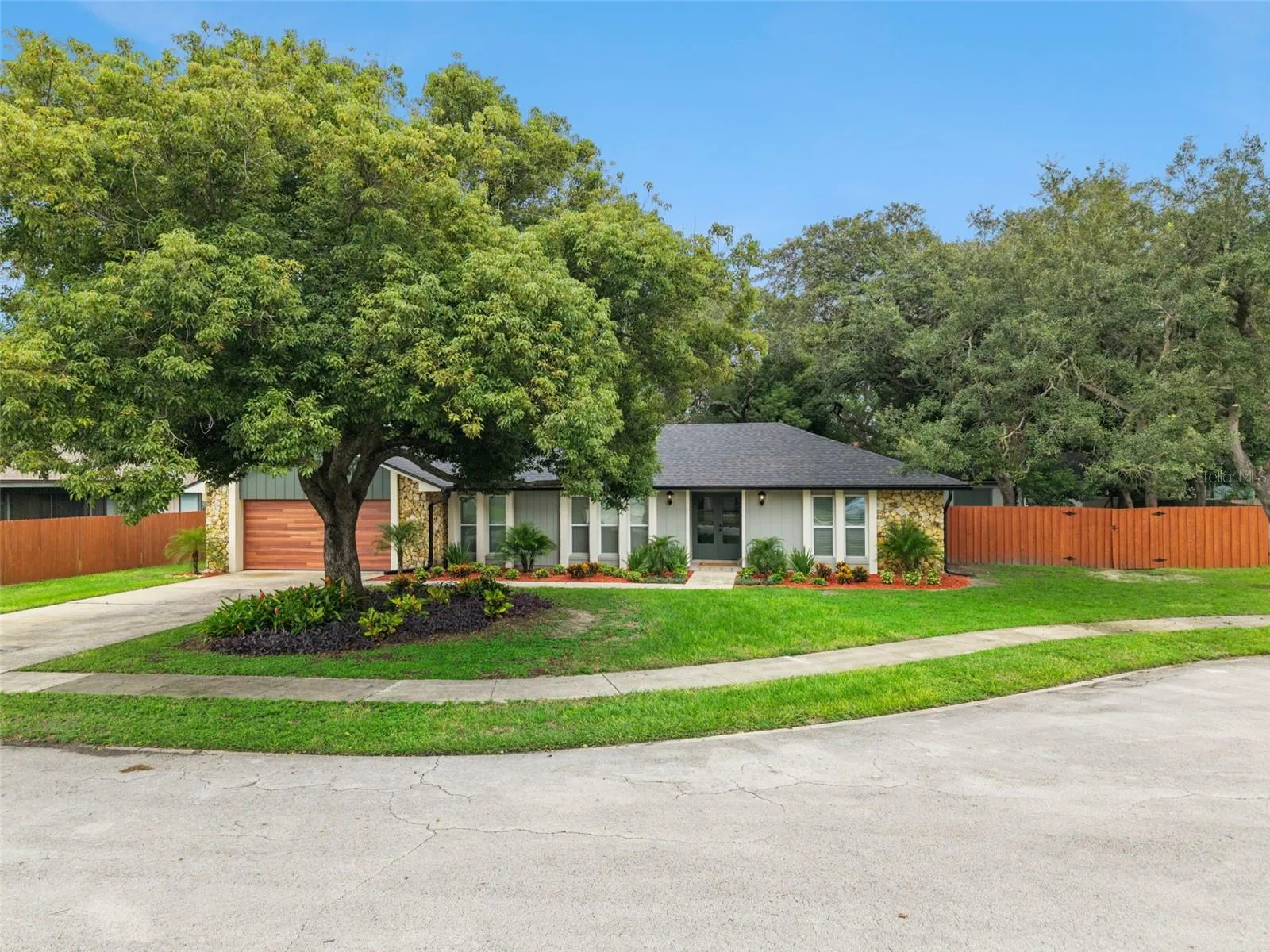 Wonderful quiet culdesac with mature trees and gorgeous landscaping.
