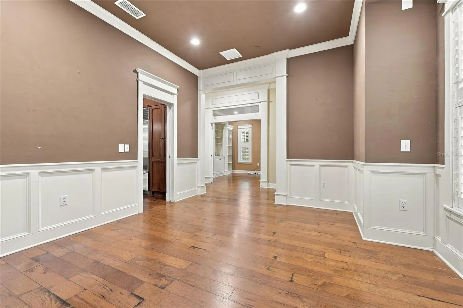 Formal Dining Room with custom plantation shutters