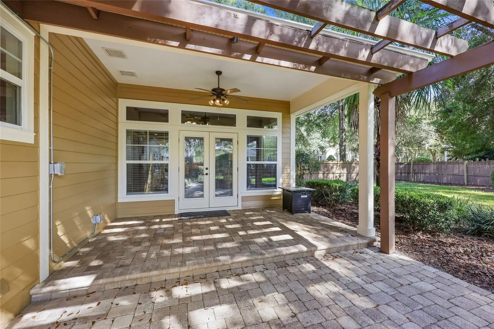Covered lanai and pergola with pavers