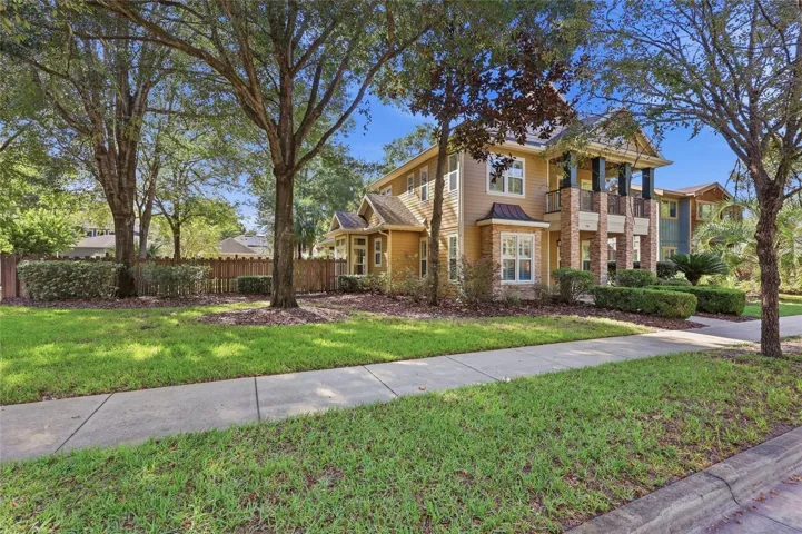 Premium .27 acre lot with oversized side yard with access road to rear entry garage