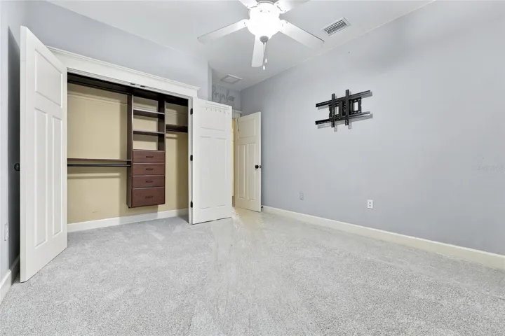Upstairs Bedroom #1 with custom shelving