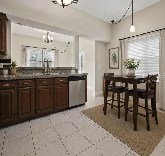Virtually staged eat-in kitchen.