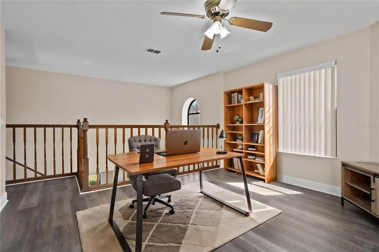 Look out over the lake as you work in the loft area.  Or, you could enclose this as a 4th bedroom.