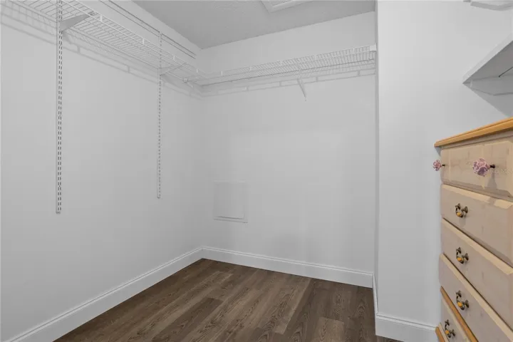 large walk in closet in primary bedroom