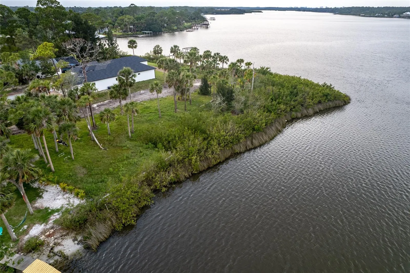 sweeping-wraparound views of Turnbull Bay.