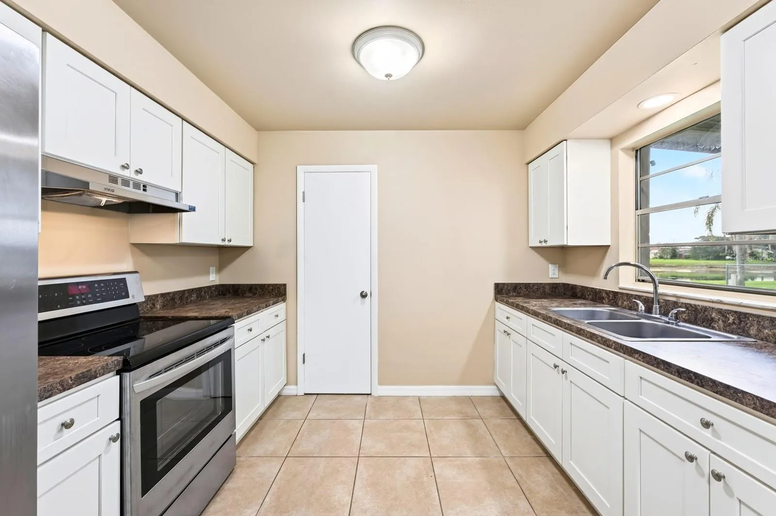 The Kitchen offers plenty of cabinetry and counter space along with STAINLESS STEEL APPLIANCES, making meal preparation easy while providing plenty of room for everyday living.