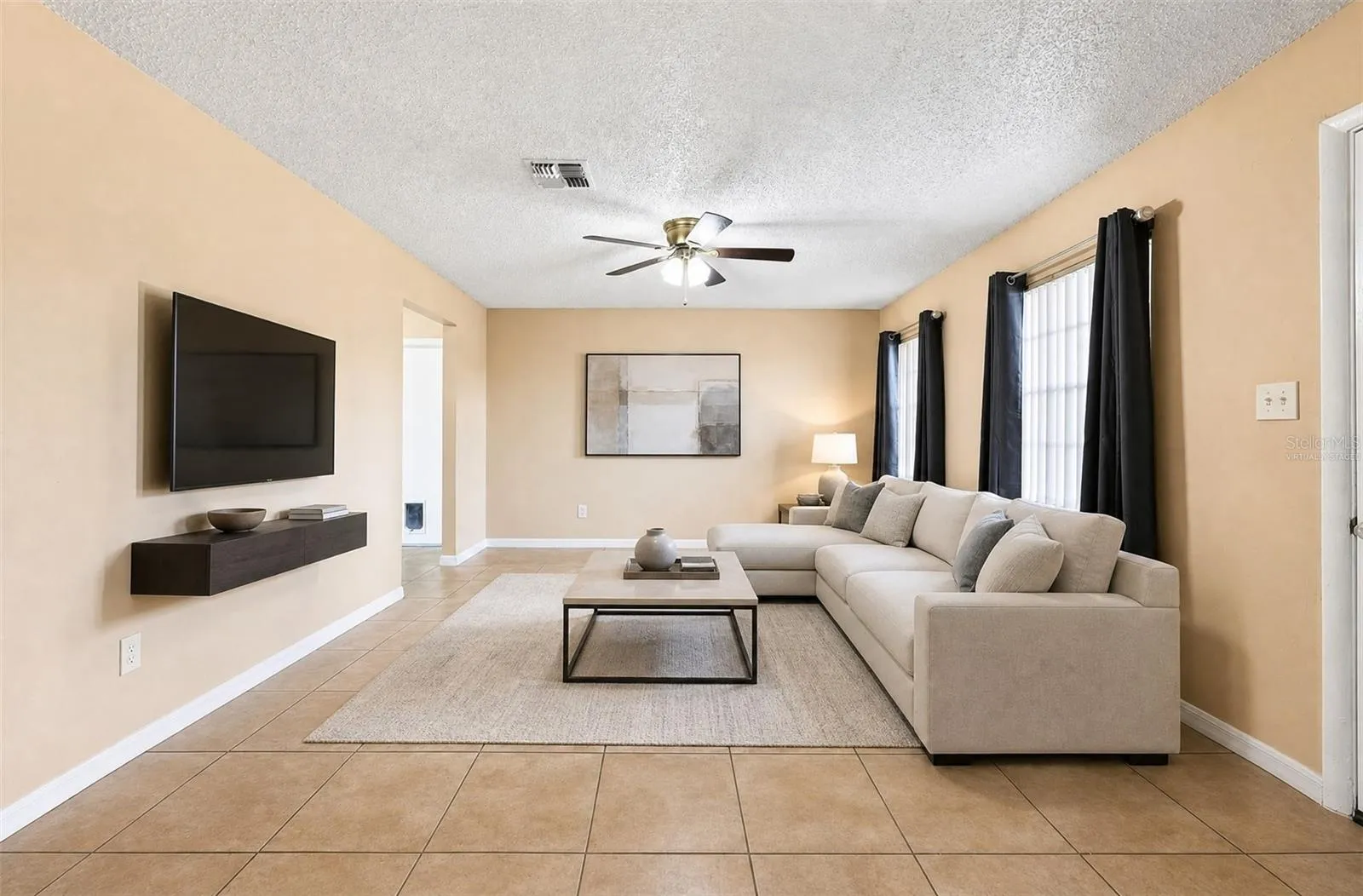 Step inside to a generous Living Room filled with NATURAL LIGHT and a welcoming sense of space. Virtually Staged