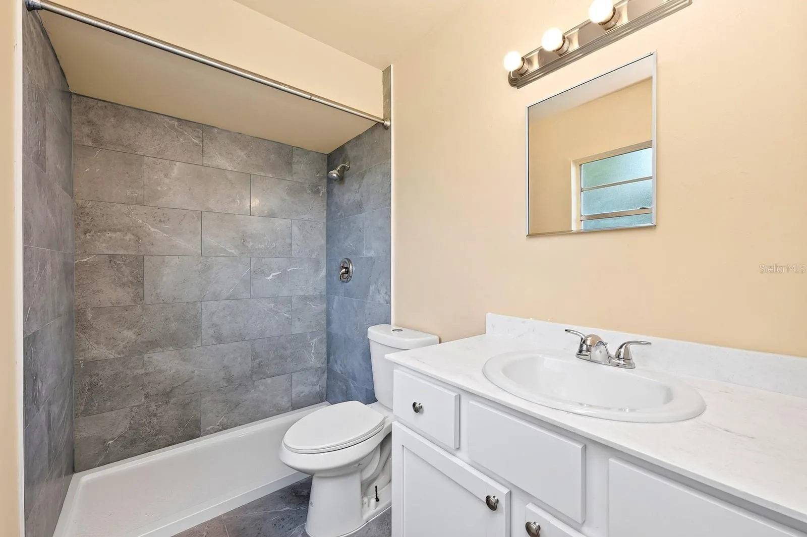 Both Bedrooms feature WOOD-LOOK VINYL FLOORING and their own EN-SUITE BATHROOMS, providing privacy and convenience.