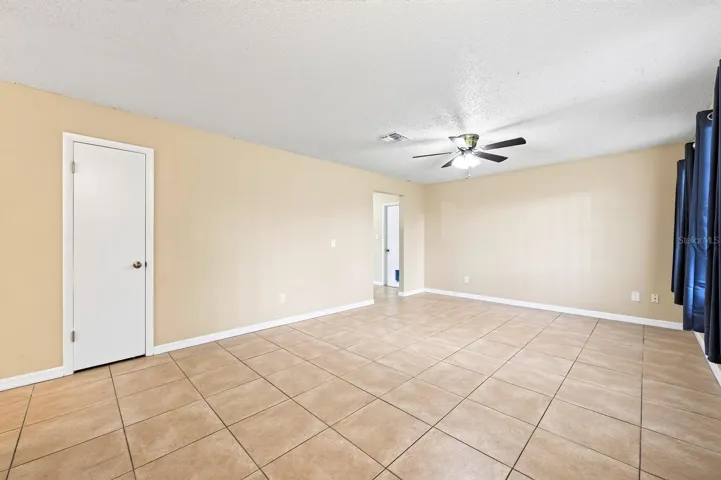 Step inside to a generous Living Room filled with NATURAL LIGHT and a welcoming sense of space.