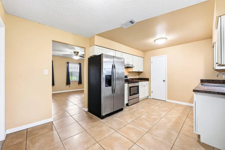 The Kitchen offers plenty of cabinetry and counter space along with STAINLESS STEEL APPLIANCES, making meal preparation easy while providing plenty of room for everyday living.