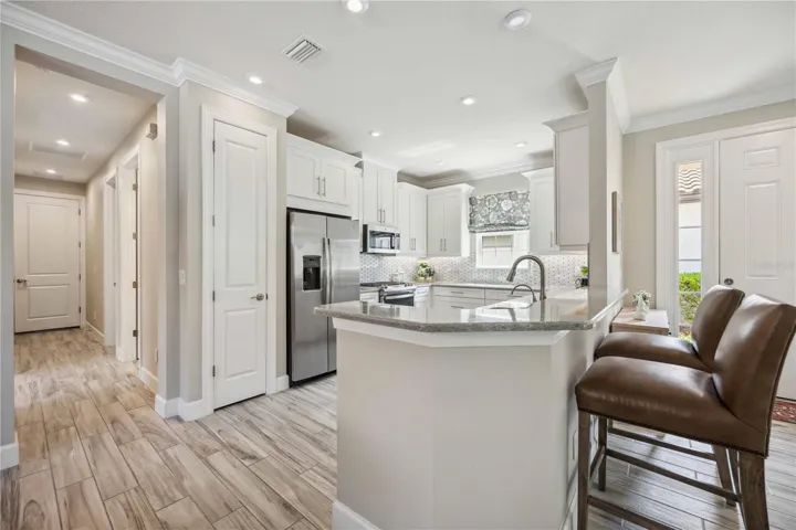 Quartz counters &amp; breakfast bar.