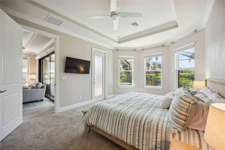 Primary suite w/ king bed.