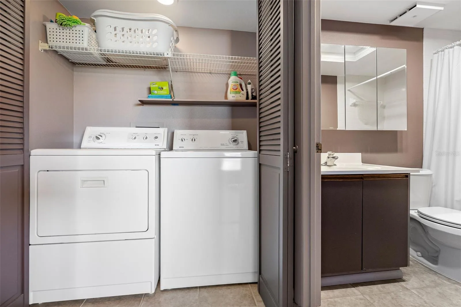 Full size laundry closet next to Guest bath