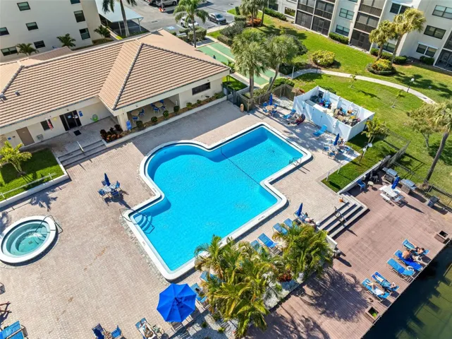 Clubhouse with pool, workout area, kitchen, billiards and more