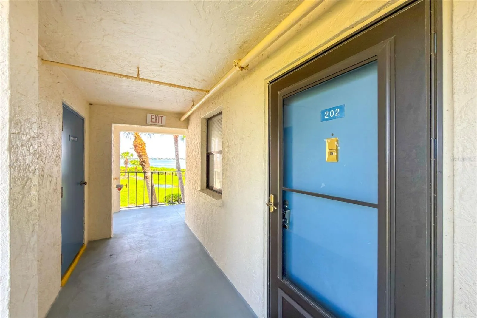 Entrance with recycle room to the left.