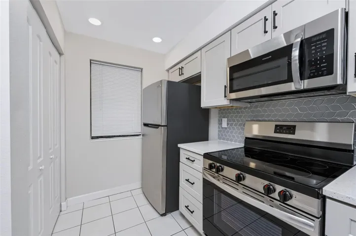 All stainless steel appliances &amp; recessed lighting.