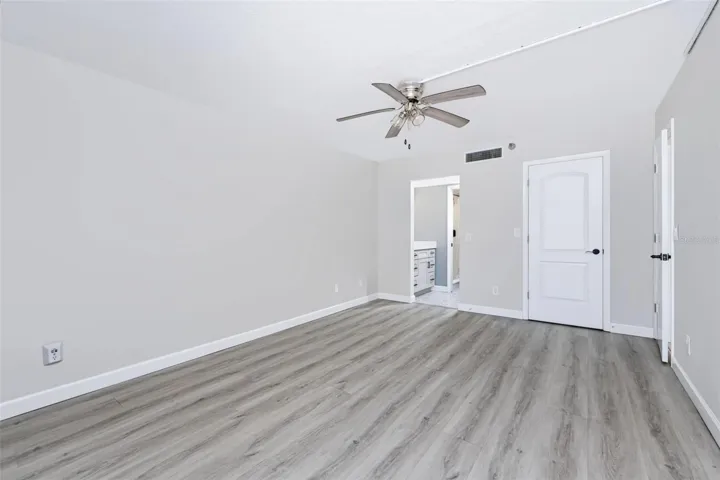 Primary Bath &amp; Laundry Closet Door Shown