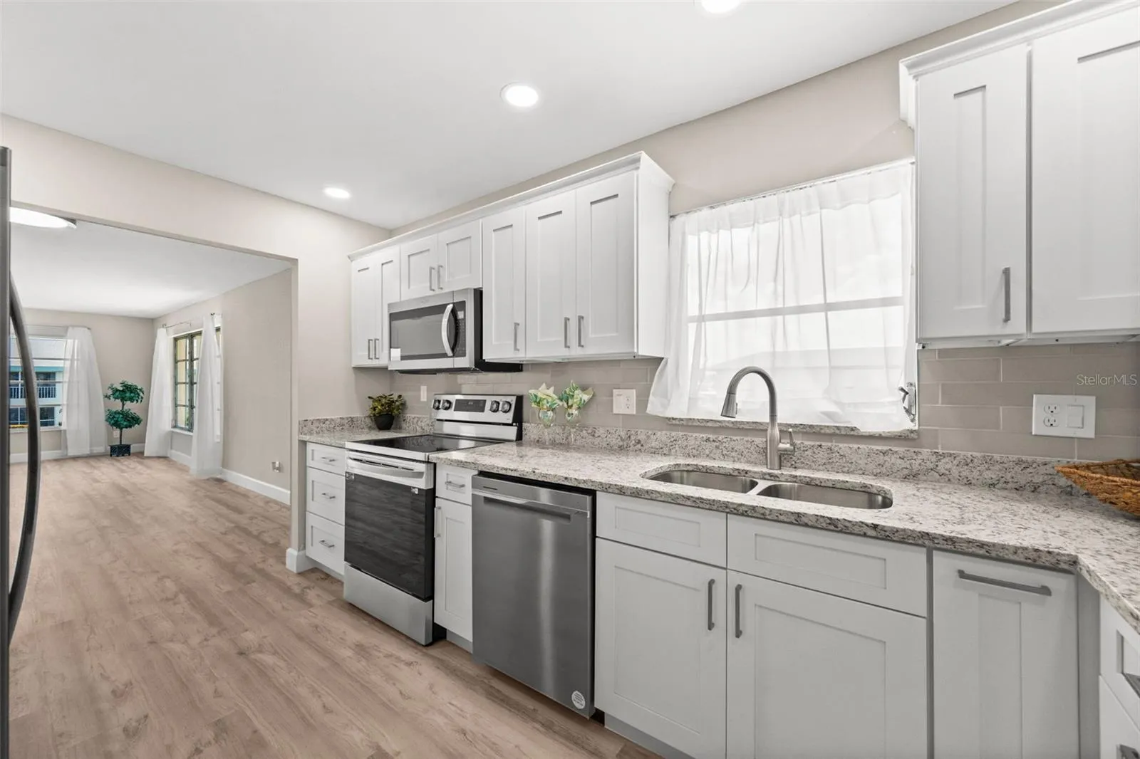 Open kitchen with lots of cabinets