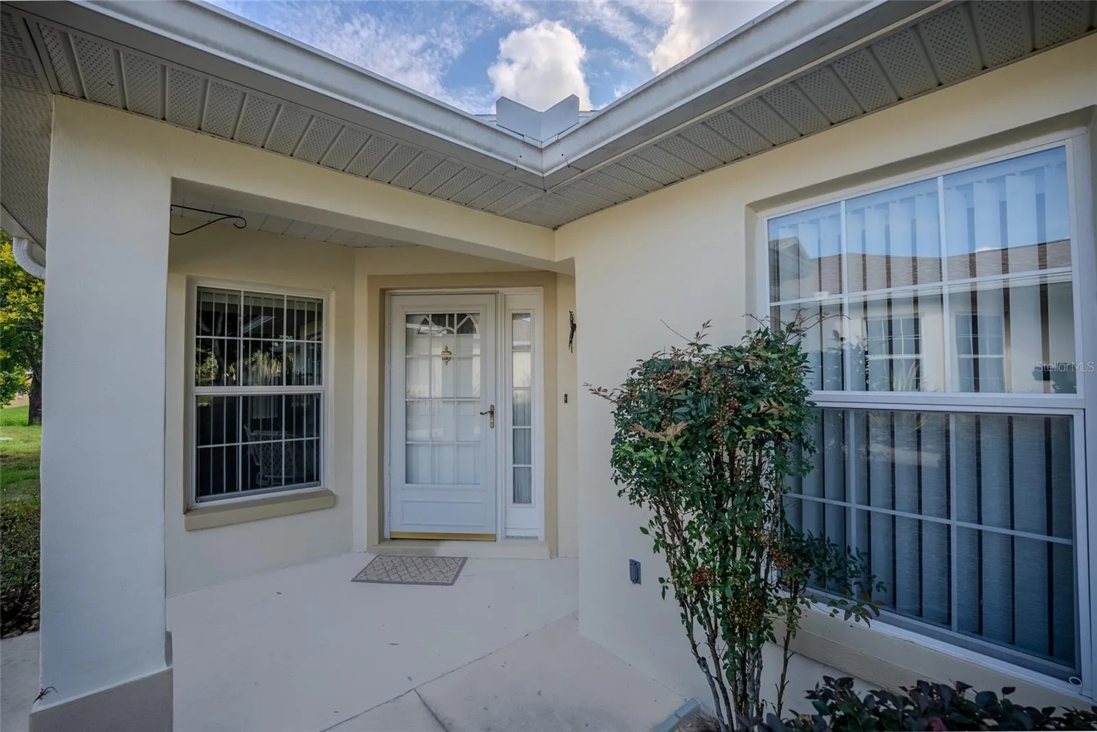 Entry area with storm door.
