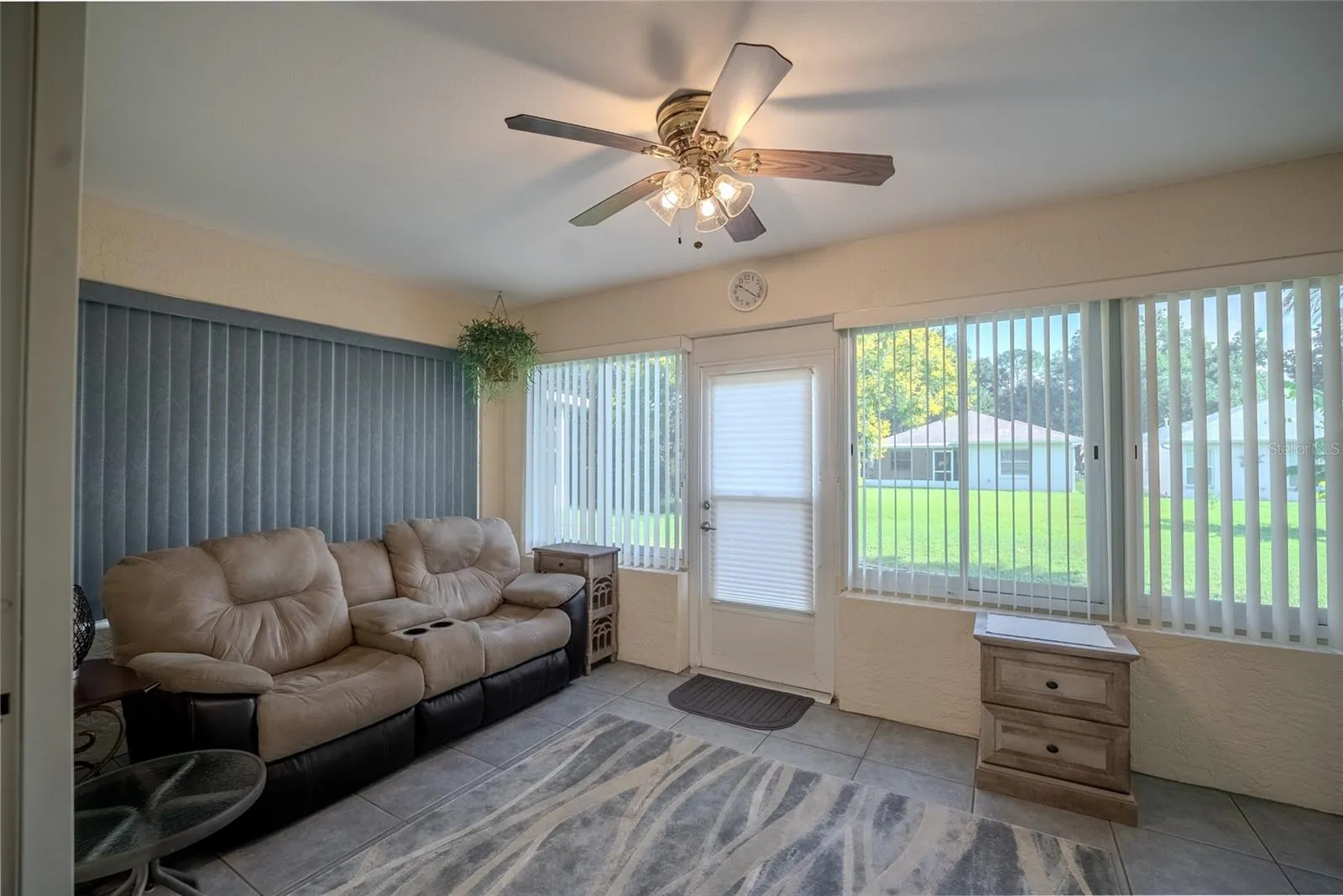 Enclosed Florida room with AC.