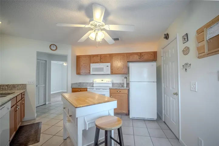 Kitchen with above cabinet lighting.