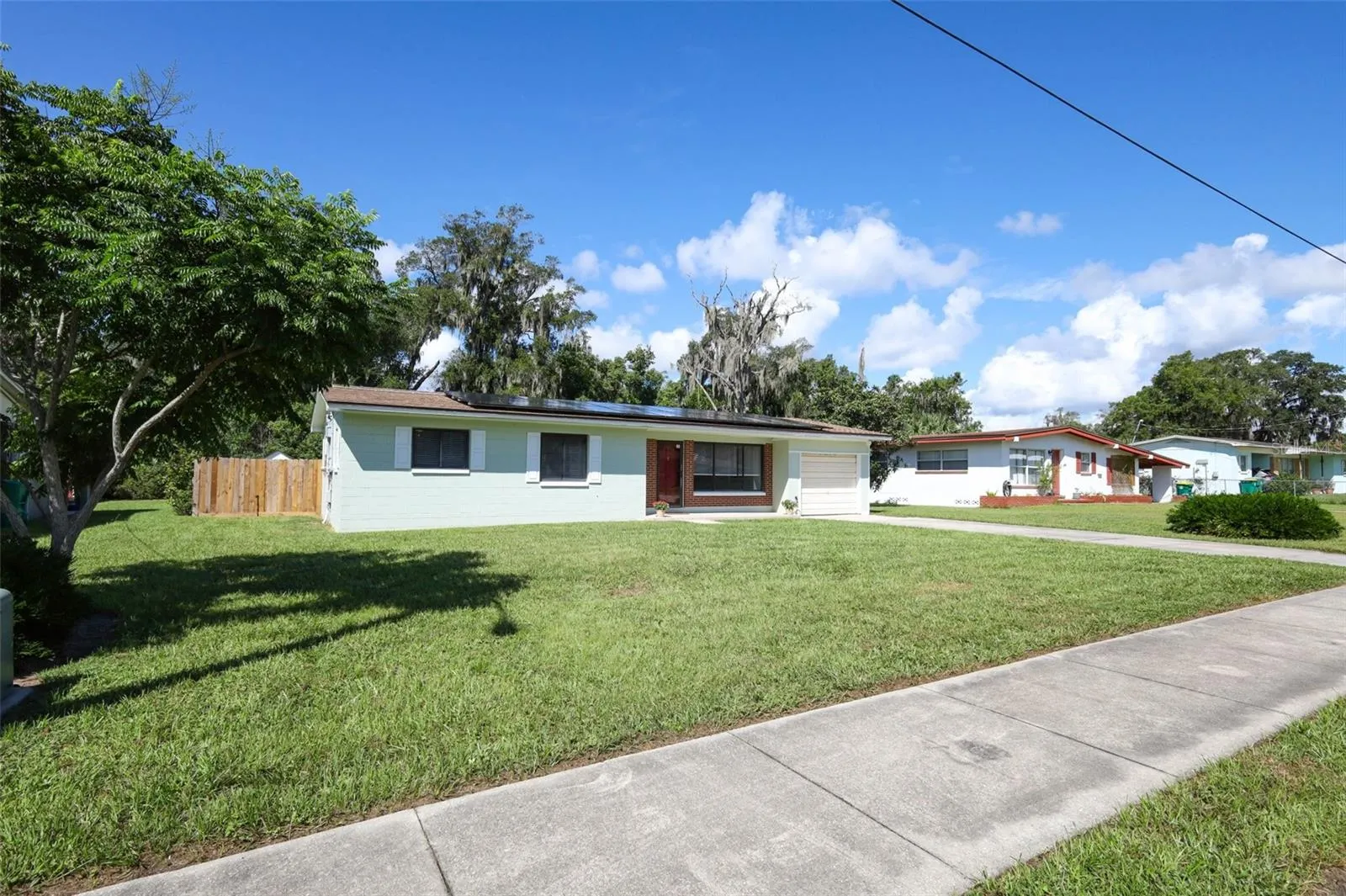 Large Front Yard with Fenced Backyard