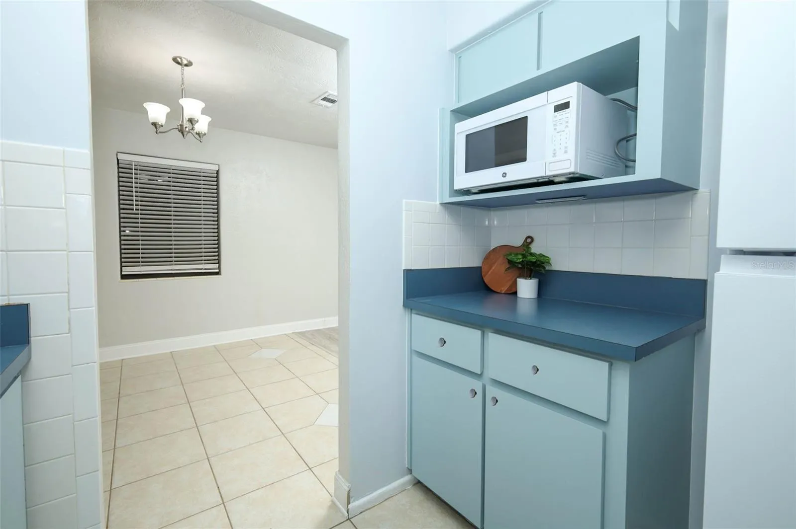 Kitchen with brand new knobs finished after photos &amp; microwave